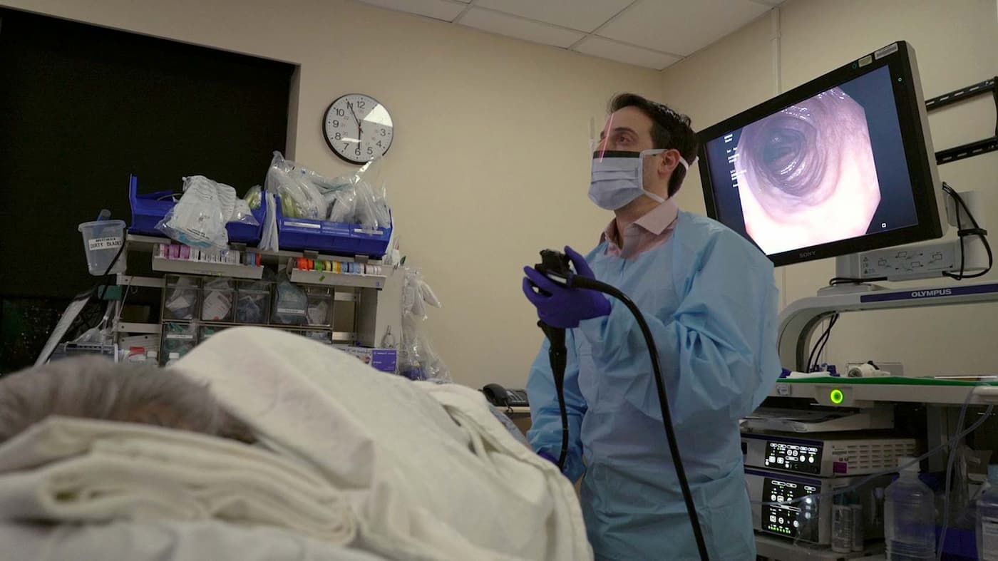 The colonoscope is introduced into the patient and Grinspan navigates" to the end of the large intestine. This colon looks healthy because the patien